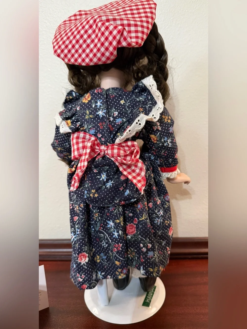 Hannah Porcelain Doll in Navy Floral Dress with Red Gingham Accents